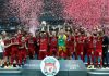 Liverpool win Super Cup after penalty shootout Liverpool's Sadio Mane lifts the trophy as he celebrates winning the UEFA Super Cup with team mates