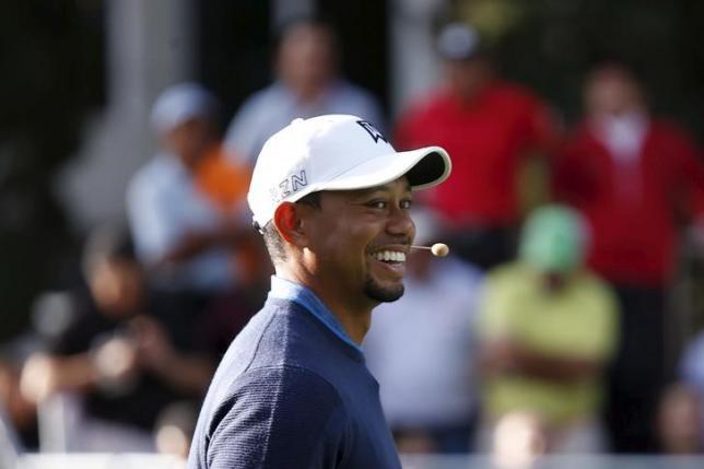 U.S. golfer Tiger Woods smiles during a golf clinic in Mexico City October 20, 2015. REUTERS/Edgard Garrido