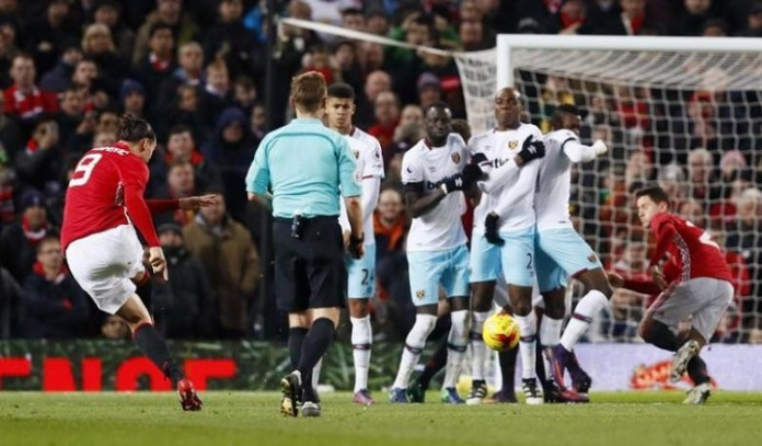 Manchester United's Zlatan Ibrahimovic shoots at goal from a free kick