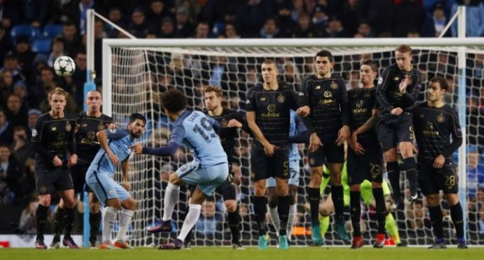 Manchester City's Leroy Sane shoots from a free kick