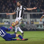 Juventus snatch win in Turin derby with Higuain brace