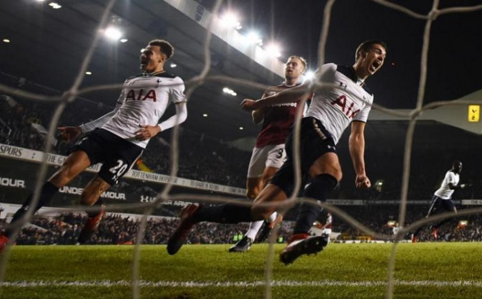 Tottenham's Harry Winks and Dele Alli celebrate their second goal