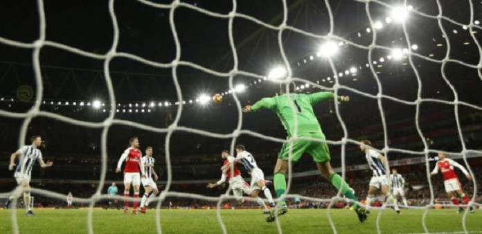 Arsenal's Olivier Giroud scores their first goal