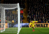Swansea coach Clement off to a winning start Crystal Palace's Wilfried Zaha scores their first goal as Swansea City's Lukasz Fabianski attempts save