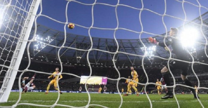 West Ham United's Andy Carroll scores their second goal