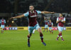Swansea crushed at home by West Ham West Ham United's Andy Carroll celebrates scoring their fourth goal
