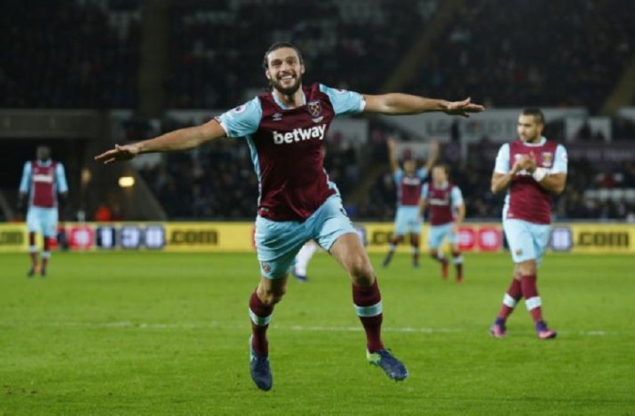 West Ham United's Andy Carroll celebrates scoring their fourth goal
