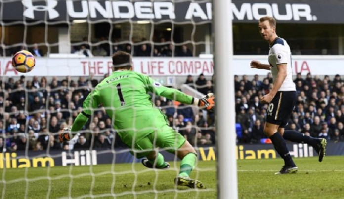 Tottenham's Harry Kane has a shot saved by West Bromwich Albion's Ben Foster