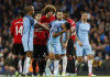 Fellaini sees red as United hold on for goalless draw at City Manchester United's Marouane Fellaini with Manchester City's Sergio Aguero after being sent off by referee Martin Atkinson