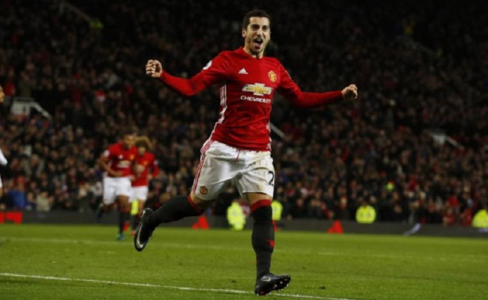 Manchester United's Henrikh Mkhitaryan celebrates scoring their third goal