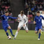 inland's Janne Saksela, Croatia's Josip Pivaric and Andrej Kramaric in action during the FIFA World Cup 2018 football qualification match between Finland and Croatia in Tampere