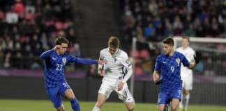 inland's Janne Saksela, Croatia's Josip Pivaric and Andrej Kramaric in action during the FIFA World Cup 2018 football qualification match between Finland and Croatia in Tampere