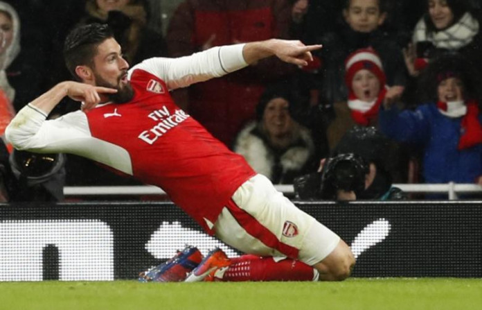 Arsenal's Olivier Giroud celebrates scoring their first goal Olivier Giroud