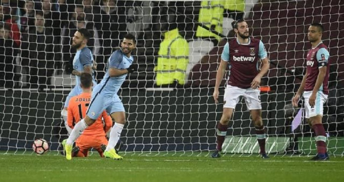 Manchester City's Sergio Aguero celebrates scoring their fourth goal