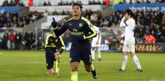 Arsenal's Alexis Sanchez celebrates scoring their fourth goal