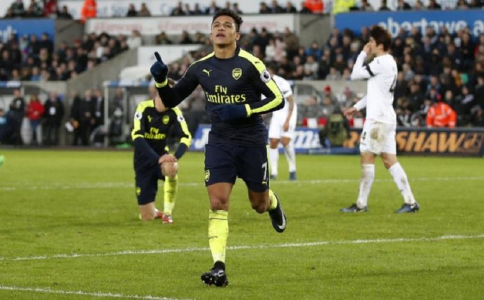 Arsenal's Alexis Sanchez celebrates scoring their fourth goal