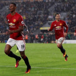 Late show helps Mourinho's United join Chelsea on top