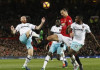 Mourinho sent off on bad day for United as Arsenal win again Manchester United's Zlatan Ibrahimovic in action with West Ham United's James Collins and Michail Antonio