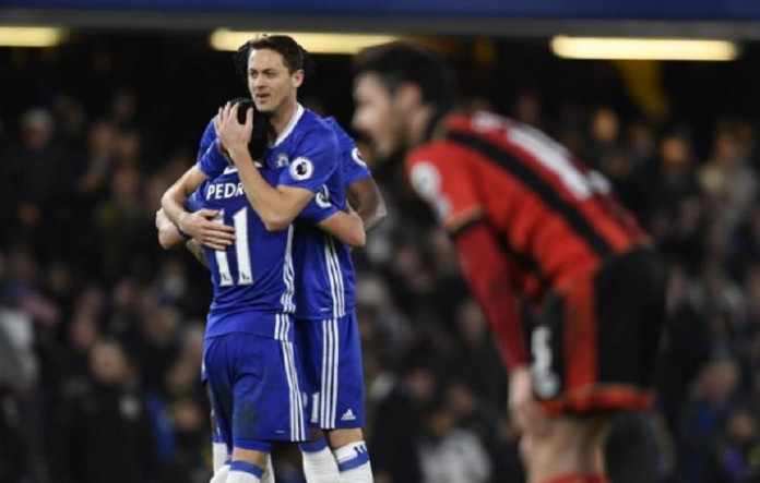 Chelsea's Pedro celebrates scoring their third goal with Nemanja Matic