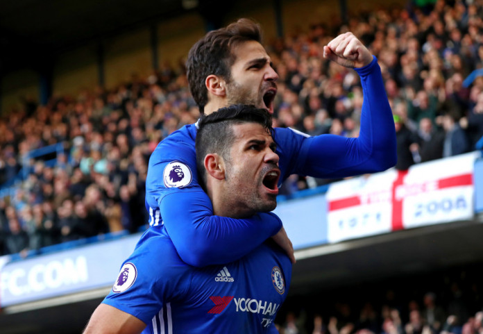 Costa fires Chelsea back to the top, United beat Spurs