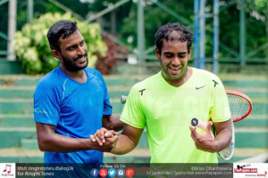 Figure 1All smiles after the final. Sanka Atukorale (L) exchanges pleasantries with Dissanayake (R)