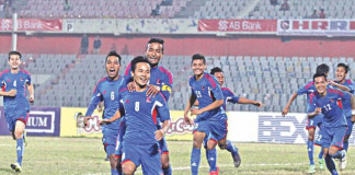 Nepal players celebrate one of their four goals against Maldives in the Bangabandhu Gold Cup semifinal at the Bangabadhu National Stadium yesterday. PHOTO: STAR