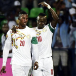 Senegal reach Nations Cup quarters, Algeria on the brink