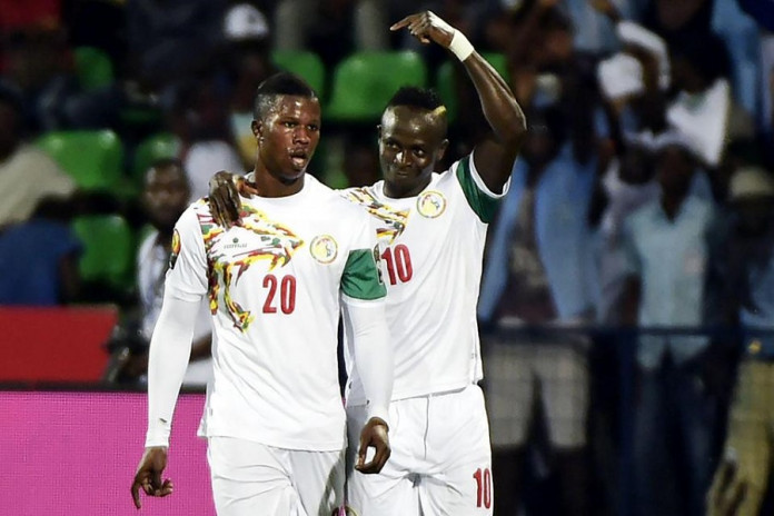 Senegal reach Nations Cup quarters, Algeria on the brink