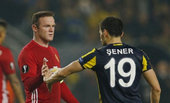 Manchester United's David De Gea and Fenerbahce's Sener Ozbayrakli