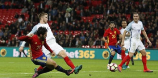 Spain's Isco scores their second goal