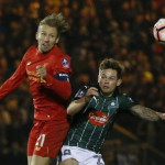 Plymouth Argyle's David Fox in action with Liverpool's Lucas Leiva