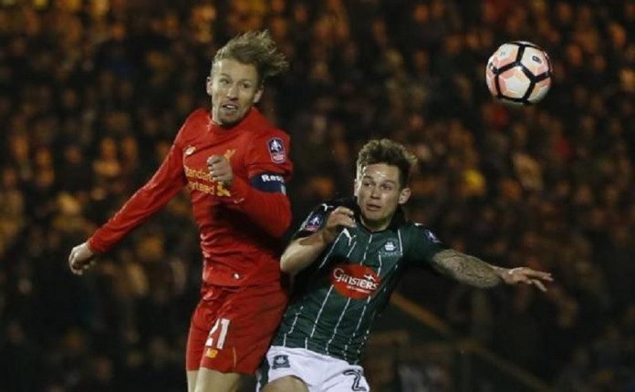 Plymouth Argyle's David Fox in action with Liverpool's Lucas Leiva