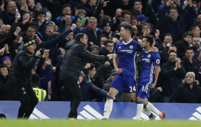 Chelsea's Pedro celebrates scoring their first goal with Gary Cahill