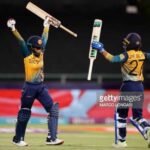Sri Lanka's Harshitha Samarawickrama (L) and Sri Lanka's Nilakshi De Silva (R) celebrate after Sri Lanka won the Group A